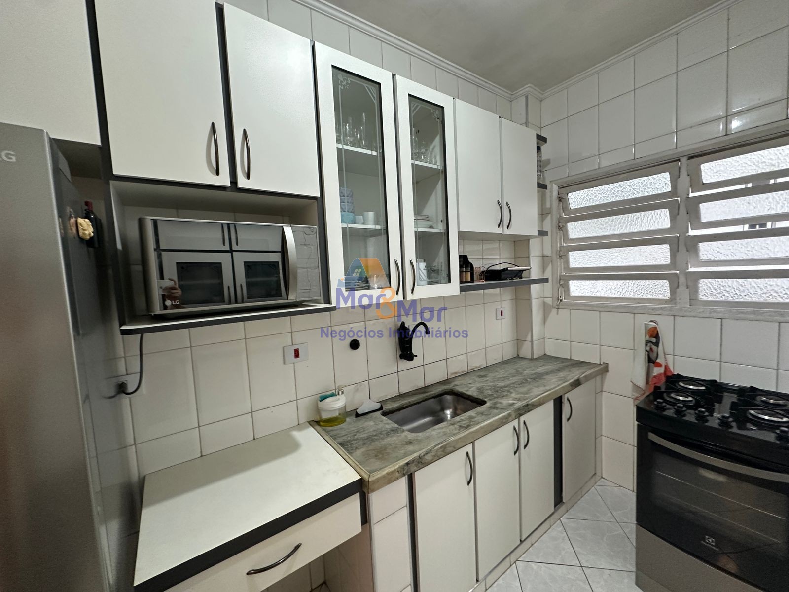 Apartamento na Praia das Pitangueiras, Guarujá - SP
